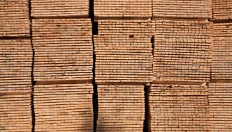 endless stacks of freshly cut wood boards