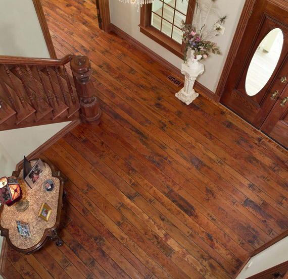 Rehmeyer hand scraped Cherry flooring with antique finish & worn square pegs