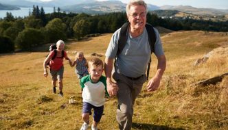 grandparents hiking with grandkids