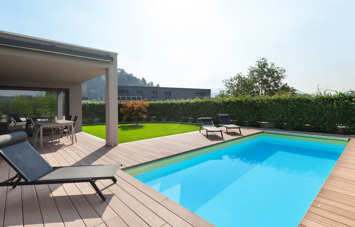 backyard deck overlooking beautiful inground pool