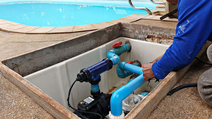 making adjustments to pool water pumping system