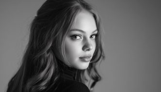 teen girl with dark hair in black and white portrait