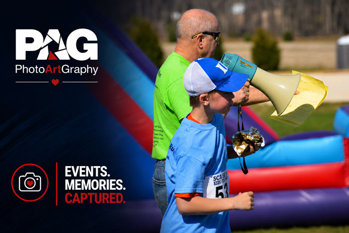 man holding a megaphone at a Shrewsbury, PA community event